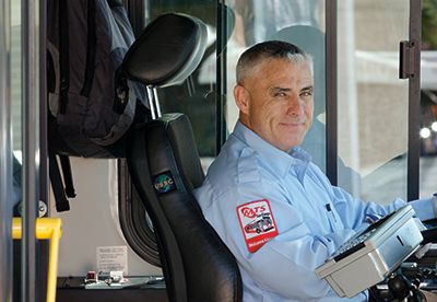 Driver of an MTS Bus looking at camera