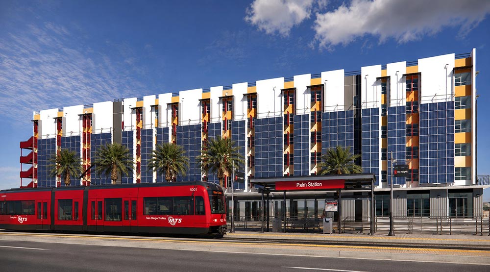 Rendering of a planned transit oriented housing development at Palm Avenue station using AI technology.