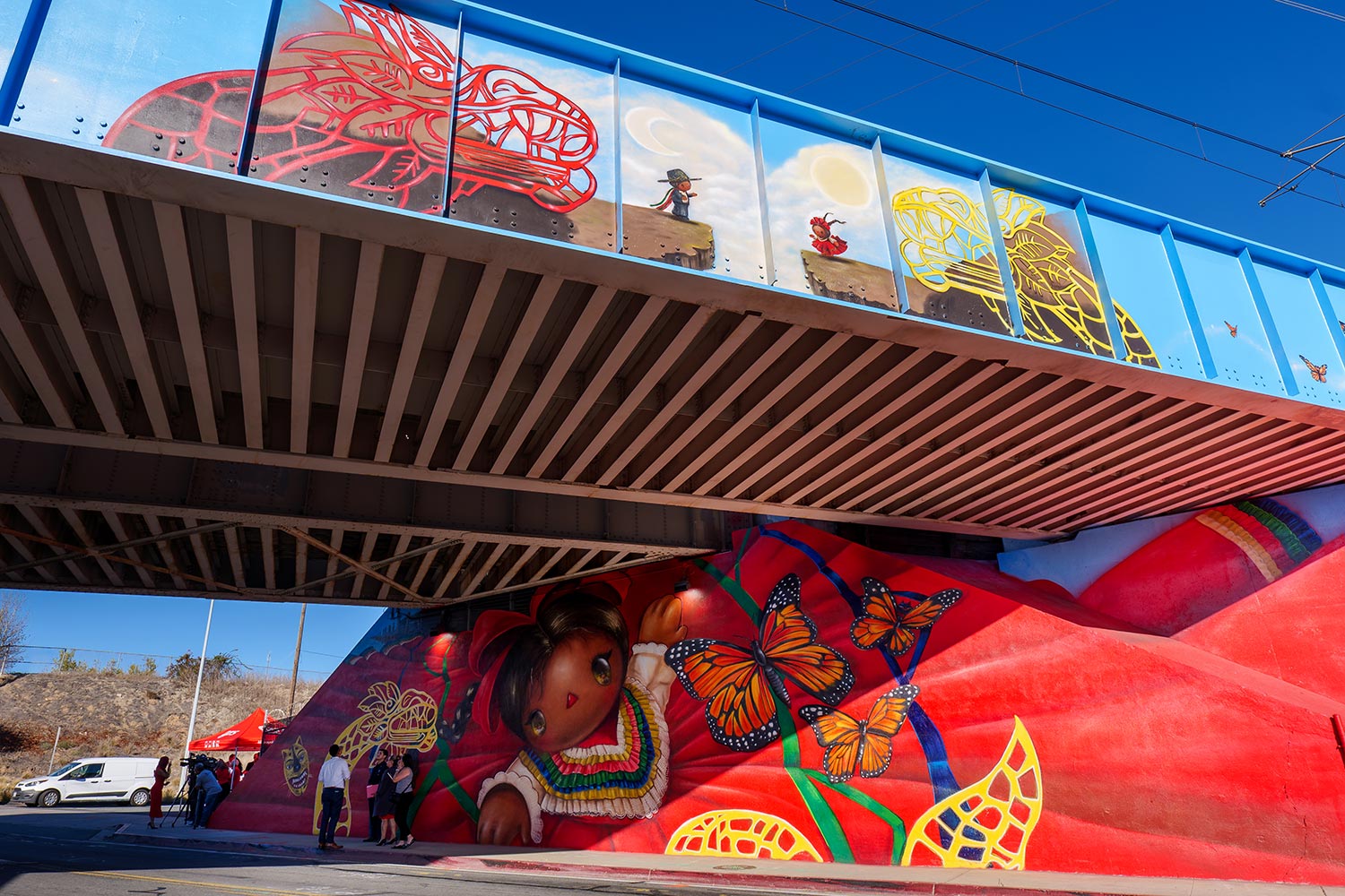 Colorful new mural near Beyer Blvd Trolley Station in San Ysidro, CA by Mr. B Baby