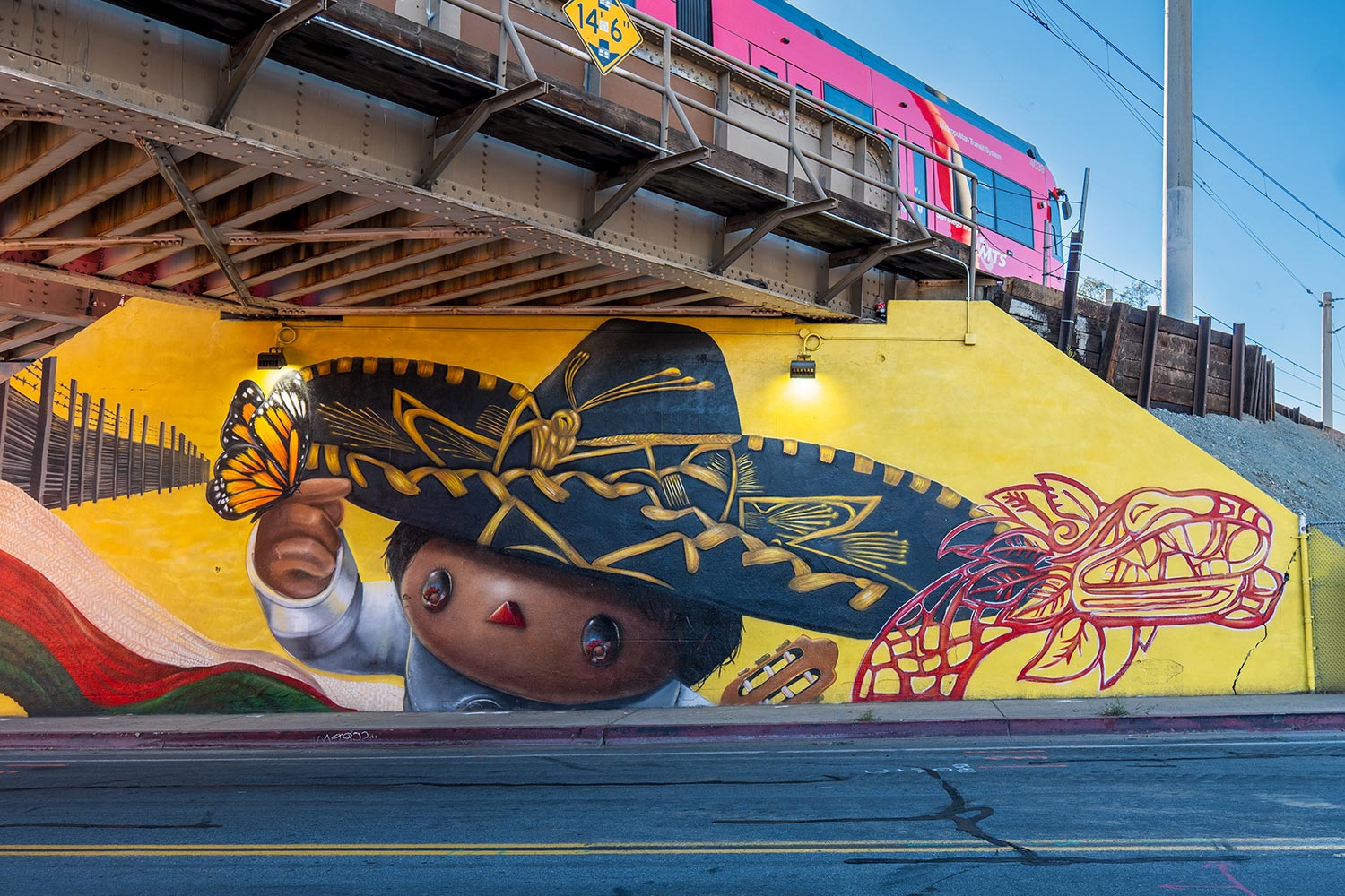 Other side of the colorful new mural near Beyer Blvd Trolley Station in San Ysidro, CA by Mr. B Baby