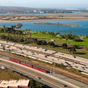 The UC San Diego Blue Line zooms by Mission Bay