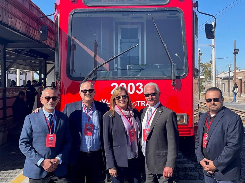 Group Shot with Trolleys in Argentina